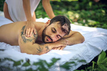 Obraz na płótnie Canvas Close up image men enjoy in massage.