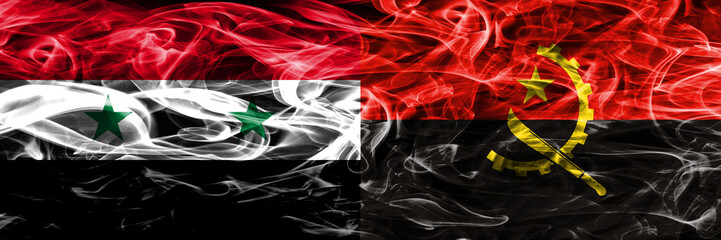 Syria vs Angola smoke flags placed side by side. Thick colored silky smoke flags of Syrian and Angola