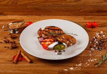 Dishes on a wooden table in white plates for a grill cafe