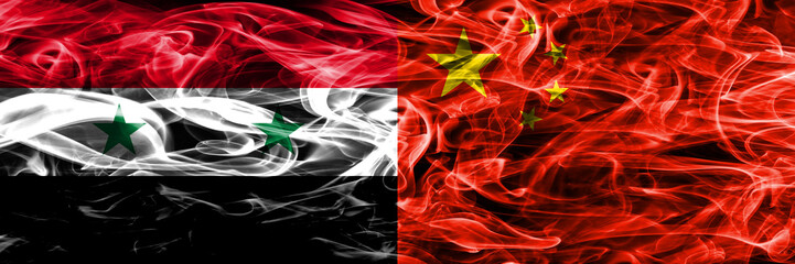 Syria vs China smoke flags placed side by side. Thick colored silky smoke flags of Syrian and China