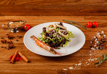 Dishes on a wooden table in white plates for a grill cafe