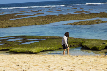 girl playing on the beach summer holiday