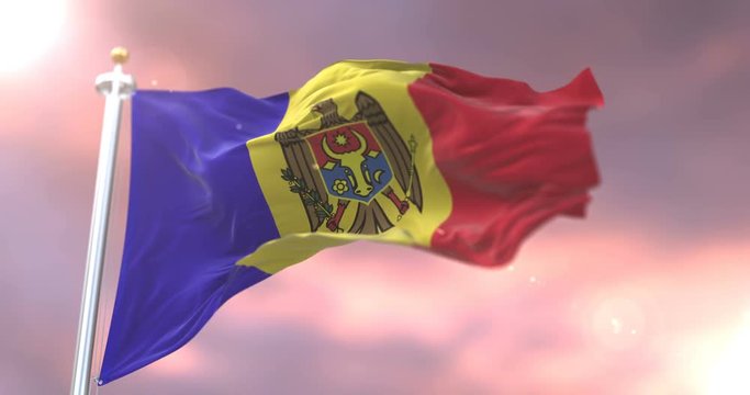 Flag of Moldova waving at wind in slow at sunset, loop
