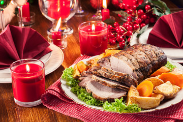 Roasted pork loin with baked potatoes