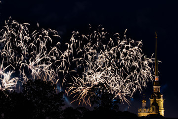Pyrotechnic show in honor of the holiday in St. Petersburg, Russia. Scarlet Sails. Peter-Pavel's Fortress. The Great Pyrotechnic Show. A stunning fire festival. Celebration. Multicolored sky. 