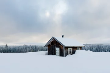 Fotobehang Old mountain cabin in winter landscape, Norway © STUEDAL