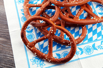 Pretzel. Beer snacks on wooden table. Bavarian oktoberfest pretzel