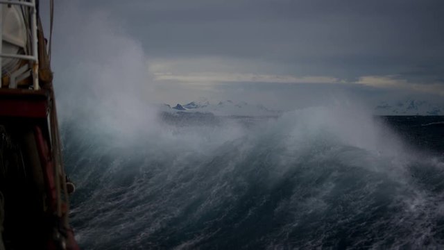Cinemagraph of boat on stormy ocean at night