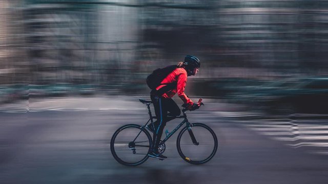 Cinemagraph of man riding bike in New York city