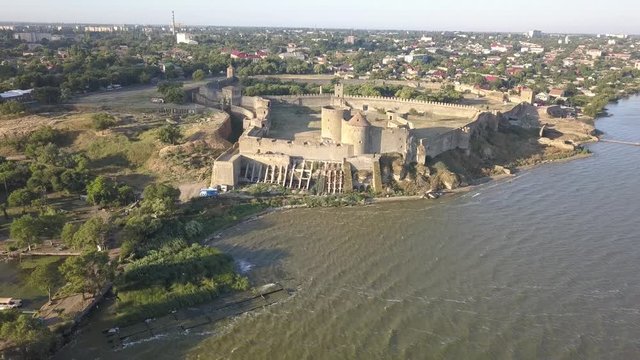 Aerial view from drone to ancient fortress Akkerman which is on the bank of the Dniester estuary, Bilhorod-Dnistrovskyi city, Odessa region, Ukraine