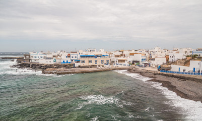 Fototapeta na wymiar Houses on the coast in Fuerteventura, Canary Islands, Spain.