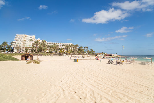 Sandy beach in front of resort in Fuerteventura, Canary Islands, Spain.