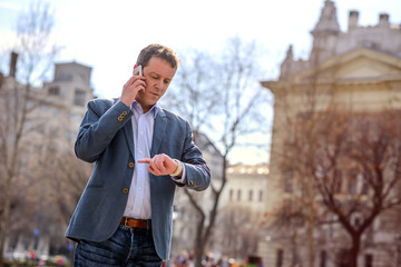 A middle age businessman in the park	