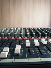 Fototapeta premium Controls on audio mixer console