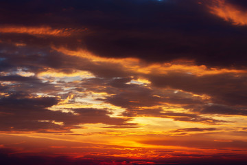 Naklejka na ściany i meble the evening sky with clouds at sunset
