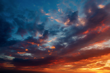 the evening sky with clouds at sunset