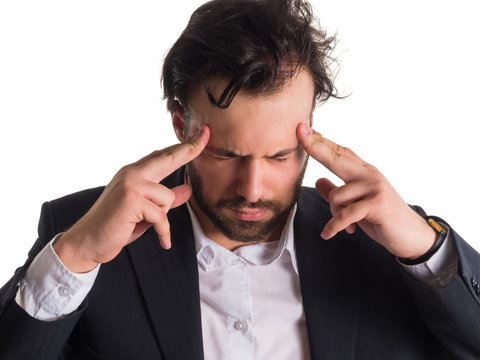 Crisis concept: Overburdened businessman closed eyes with both hands at head and shouting isolated on white background