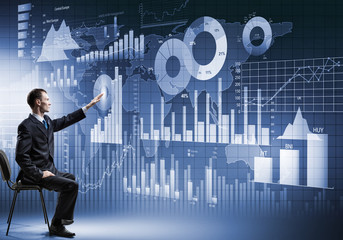 Businessman using media interface