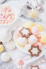 Marshmallow, cookies, meringues and different Christmas decorations