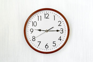Simple round clock on a wall