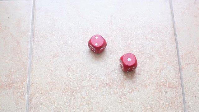 cubes in hand, concept of luck. Video close-up, high quality