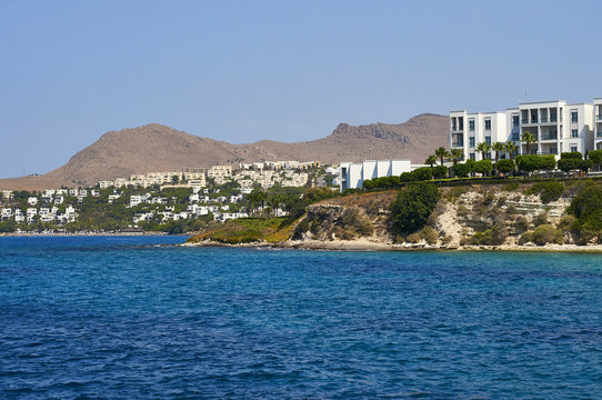 Aegean Sea and blue sky. Coast of Turkey between Mugla and Akyarlar. The precipitous coast. Rest and travel..