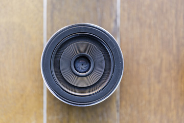 Camera lens with dust on the surface of the lens.