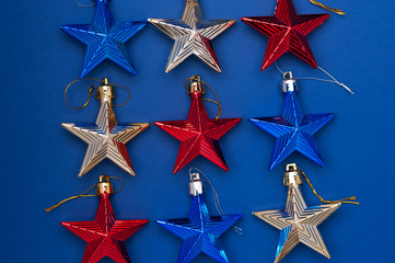 Naklejka premium Merry Christmas and Happy New Year. Flat lay, top view holiday decoration stars. Place for text