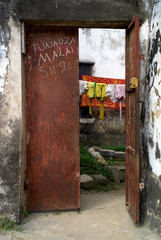 Picturesque Steel Door, Stone Town, Zanzibar; translation of text on door: 