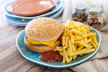 Cheese burger - American cheese burger with Golden French fries