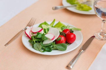 Fresh health organic vegetables on a plate.