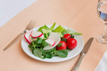 Fresh health organic vegetables on a plate.