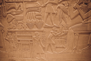 Egyptian Hieroglyphic carvings on the exterior walls of an ancient temple