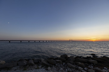 &Ouml;resund bridge at the evening with sunset