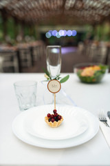 Elegant wedding table arrangement, floral decoration, restaurant. Wedding table setup. Wedding in the forest