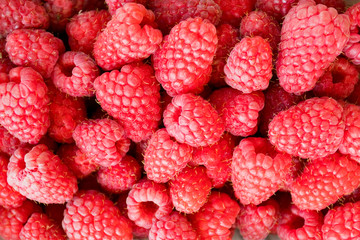 Fresh, sweet raspberries background