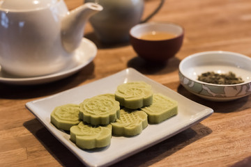 green mooncake on table