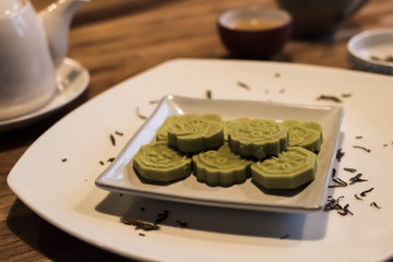 green mooncake on table