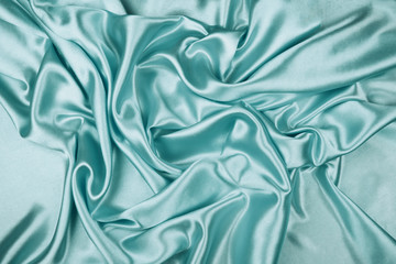 Obraz premium Green luxury satin fabric texture for background