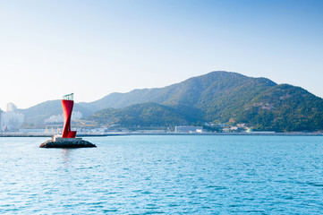Fototapeta premium Red lighthouse at Yeosu expo port, South Korea