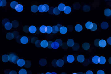 Blurred abstract bokeh background. Blue lights