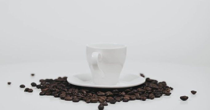 White ceramic empty coffee cup and saucer