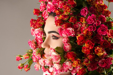 Beauty makeup profile face woman with roses closeup 