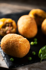 arancini di riso, fried risotto rice balls, italian sicilian food