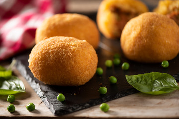 arancini di riso, fried risotto rice balls, italian sicilian food