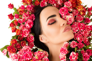 gorgeous woman makeup face with red roses flower closeup