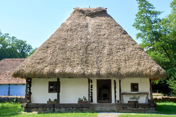 Fototapeta na wymiar Traditional house with hay roof