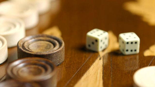 Close up dices on the backgammon surface