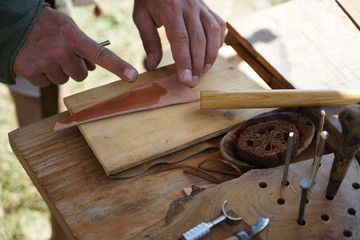Editing and engraving leather is an old art of craftsmanship
