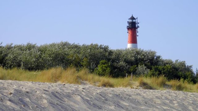 Leuchtturm Hörnum Sylt mit Dünen Landschaft  und Strand